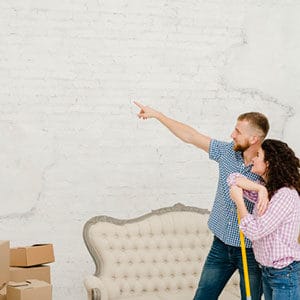 man and women watching wall