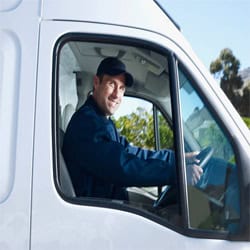 man driving a van